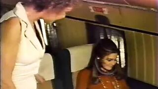 Mature is licking a young girl on an airliner