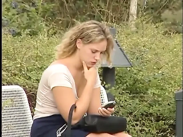 Cute blonde chick blows hard cock outdoors