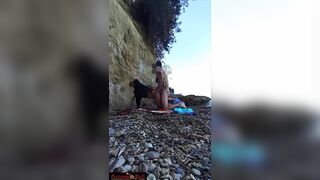 On a beach sex at the risk of being seen