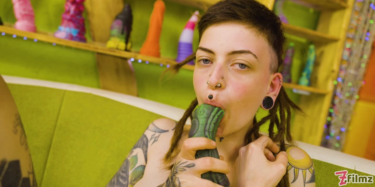 Tattooed Dreadlock Queen Takes on the Toy Wall, Solo Ink