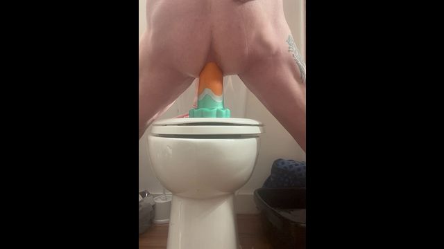 Anal toy fist riding