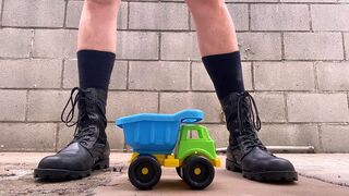 Crushing Toy Truck in Combat Boots