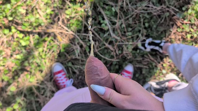 The stepmother takes out her stepson's penis and lets him pee.