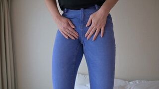 girl peeing in jeans and they are wet