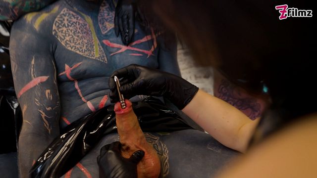 Latex Dominatrix Trio Sound & Finger the Tattooed Slave’s Cock