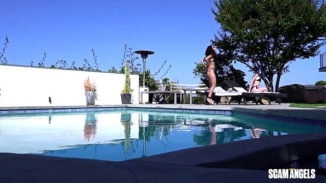 Two Bikini Babes Get Handsy by the Pool on a Sunny Afternoon