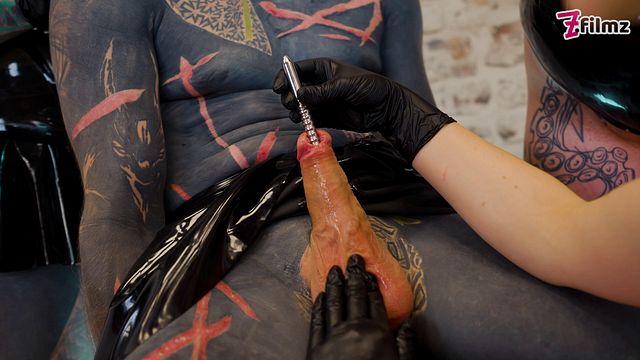 Tattooed Slave’s Cock Destroyed by Triple Latex Femdom Sounding & Finger Play