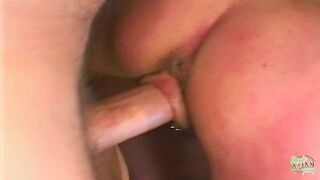 She stands on the table and leans her pussy closer to his pillar