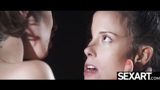 Busty lesbians in black leather lick each other to orgasm