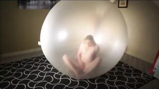 Pop and masturbing inside giant balloon