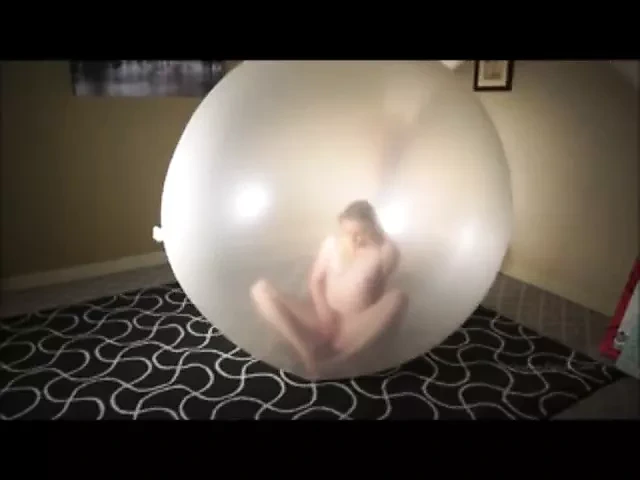 Pop and masturbing inside giant balloon