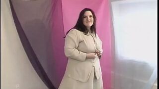 BBW brunette strips down to her birthday suit and shows cunt