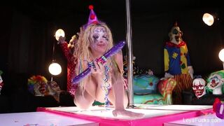Clown Leya Falcon plays with a big purple dildo