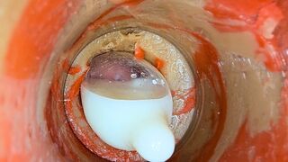 The camera 4k inside the deep pussy records a huge ejaculation with a stuck condom