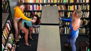 A Brunette With Glasses Gave A Cap To A Student In The Library - Mandy Waters
