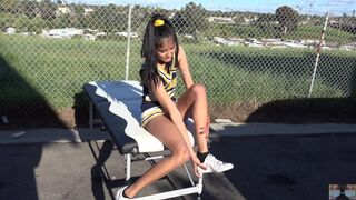 Looking up close at this cheerleader with no panties