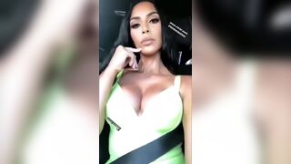 'Kim K' massive cleavage in a car