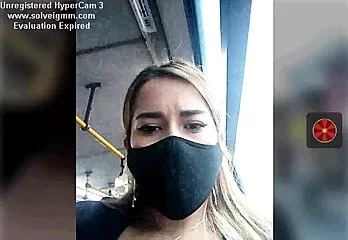 Girl on a bus shows her tits, risky
